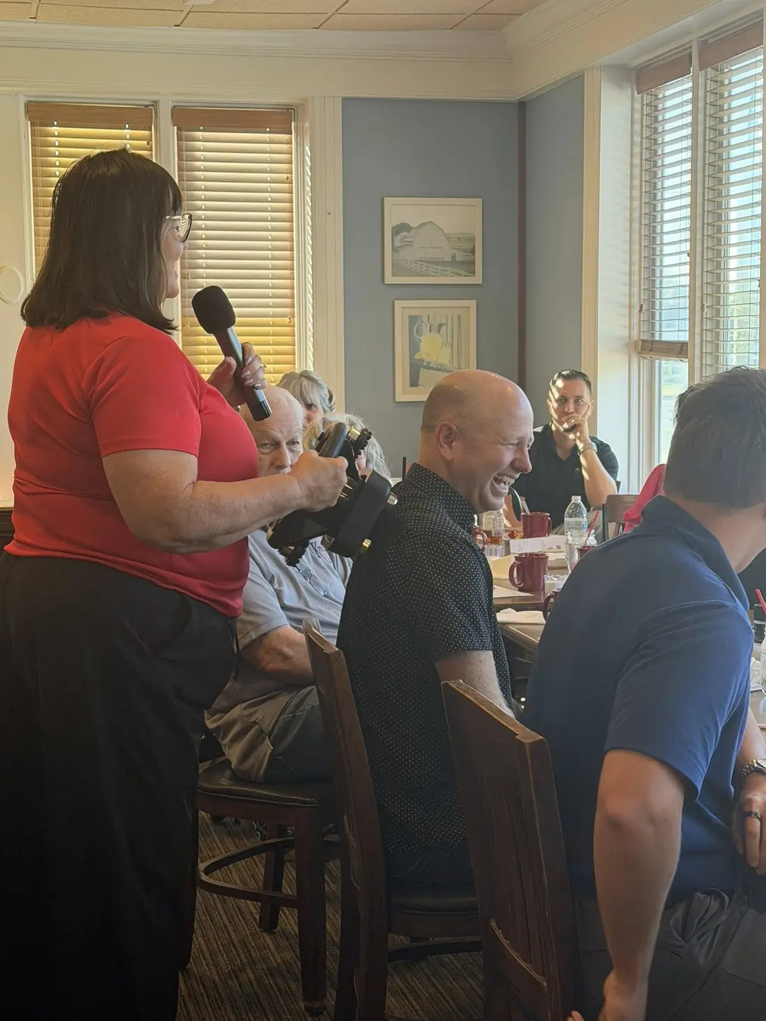 A TPBG member sharing with the group at a Monday meeting