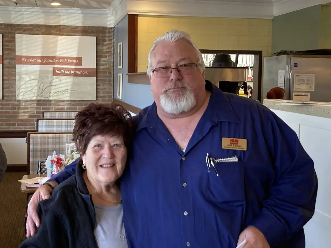 A TPBG member posing with the Bob Evans manager